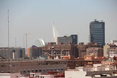 a city skyline with tall buildings and buildings at Sea You Hotel Port Valencia in Valencia