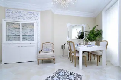 a white dining room with a white table and chairs at Joaquín Sorolla in Valencia