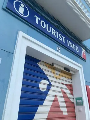 a front door of a to test inc store at Estrella azul/ Blue star in Puerto de Sagunto