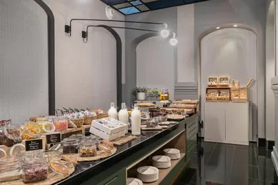 a buffet line with many different types of food at Vincci Palace in Valencia