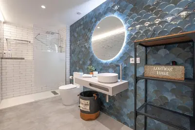 a bathroom with a sink and a mirror at Loft con carácter en Valencia. in Valencia