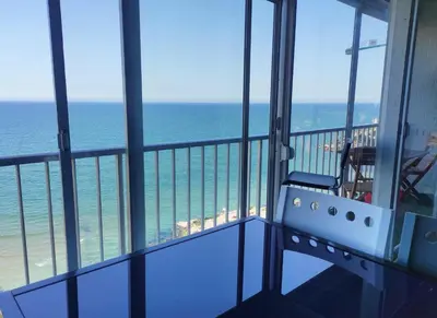 a view of the ocean from a balcony of a building at Terrace & Sea Views in Cullera in Faro de Cullera