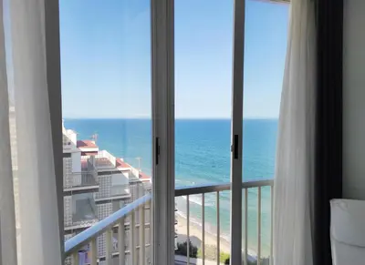 a view of the ocean from a hotel room at Terrace & Sea Views in Cullera in Faro de Cullera