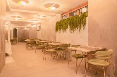 a row of tables and chairs in a restaurant at The Valentia Corretgería in Valencia