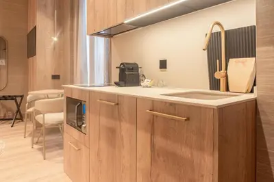 a kitchen with a sink and a microwave at The Valentia Corretgería in Valencia