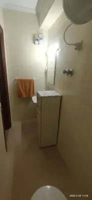 a small bathroom with a toilet and a sink at Apartamento 1ª línea de Playa in Puebla de Farnals