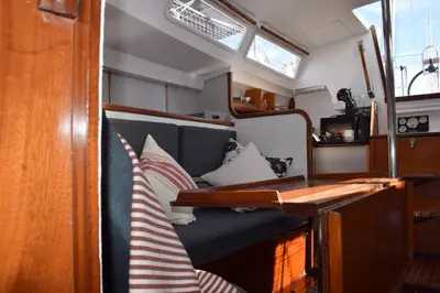 a living room with a couch and a table at Velero en Puerto de Valencia - E&M Boats in Valencia