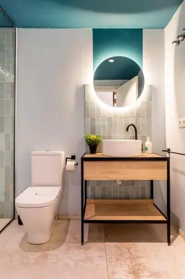 a bathroom with a toilet and a sink and a mirror at CHARMING LOFT IN RUZAFA, SOHO b2 in Valencia