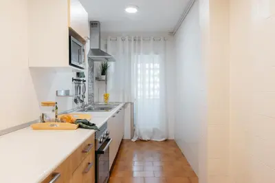 a kitchen with a sink and a counter top at Your Sunny & Spacious Portview Home in Valencia