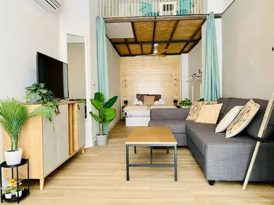 a living room with a couch and a table at B1 Verdeguer - Flat close to the Beach in Valencia
