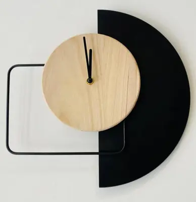 a wooden and black clock on a wall at B3 Verdeguer - Cozy Loft Close to the Beach in Valencia