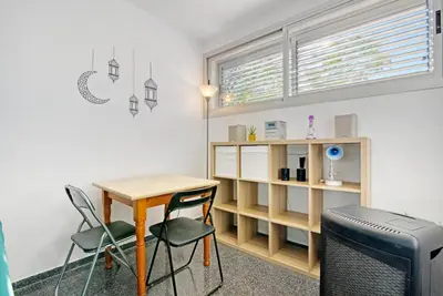 a room with a desk and two chairs and a table at Sagunto - Albalat de Tarongers - Estivella - Gilet in Albalat de Taronchers