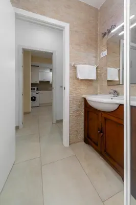 a bathroom with a sink and a mirror and a counter at Nest Silence in Valencia